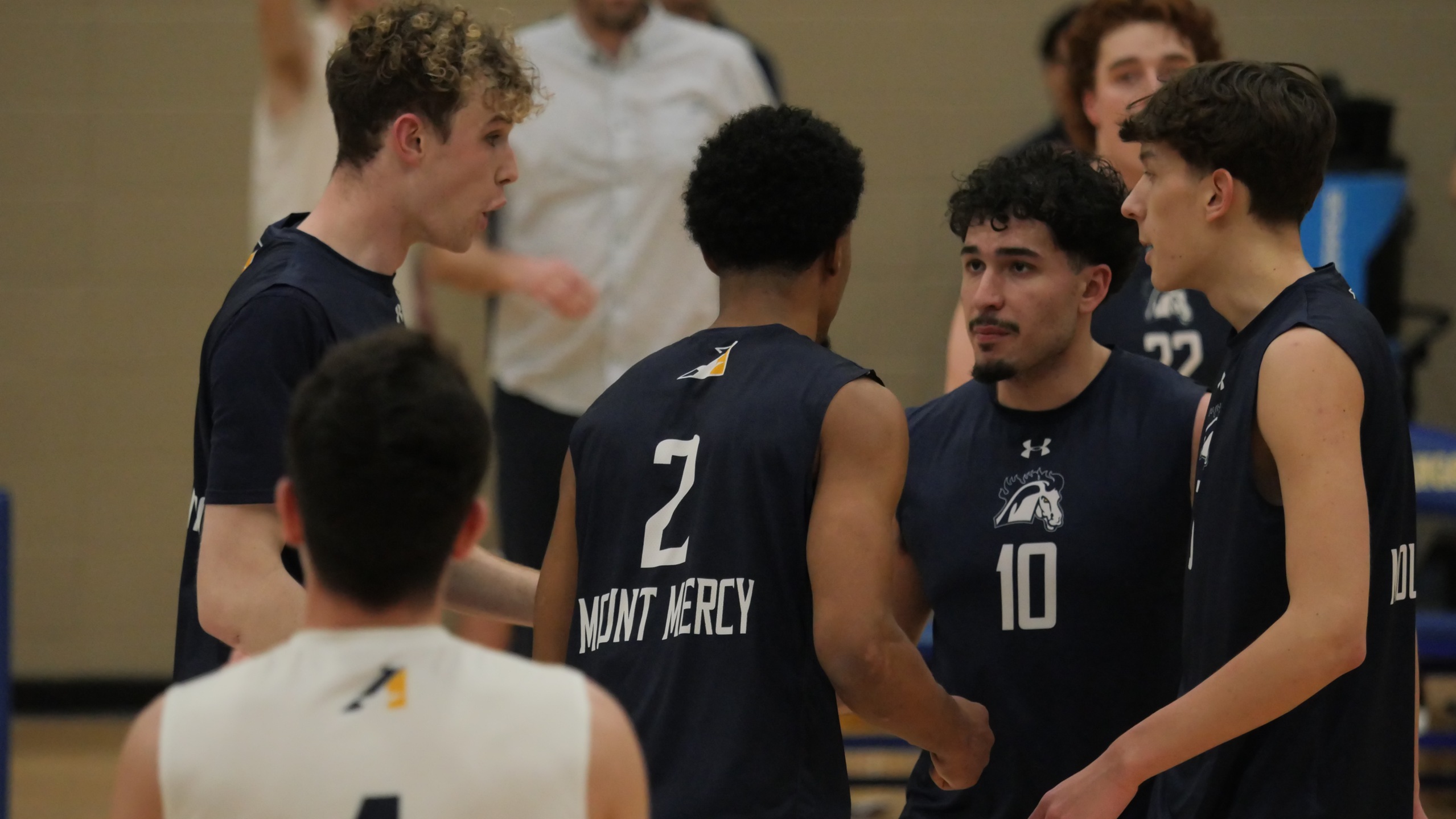 Mustangs split road trip, get first league win
