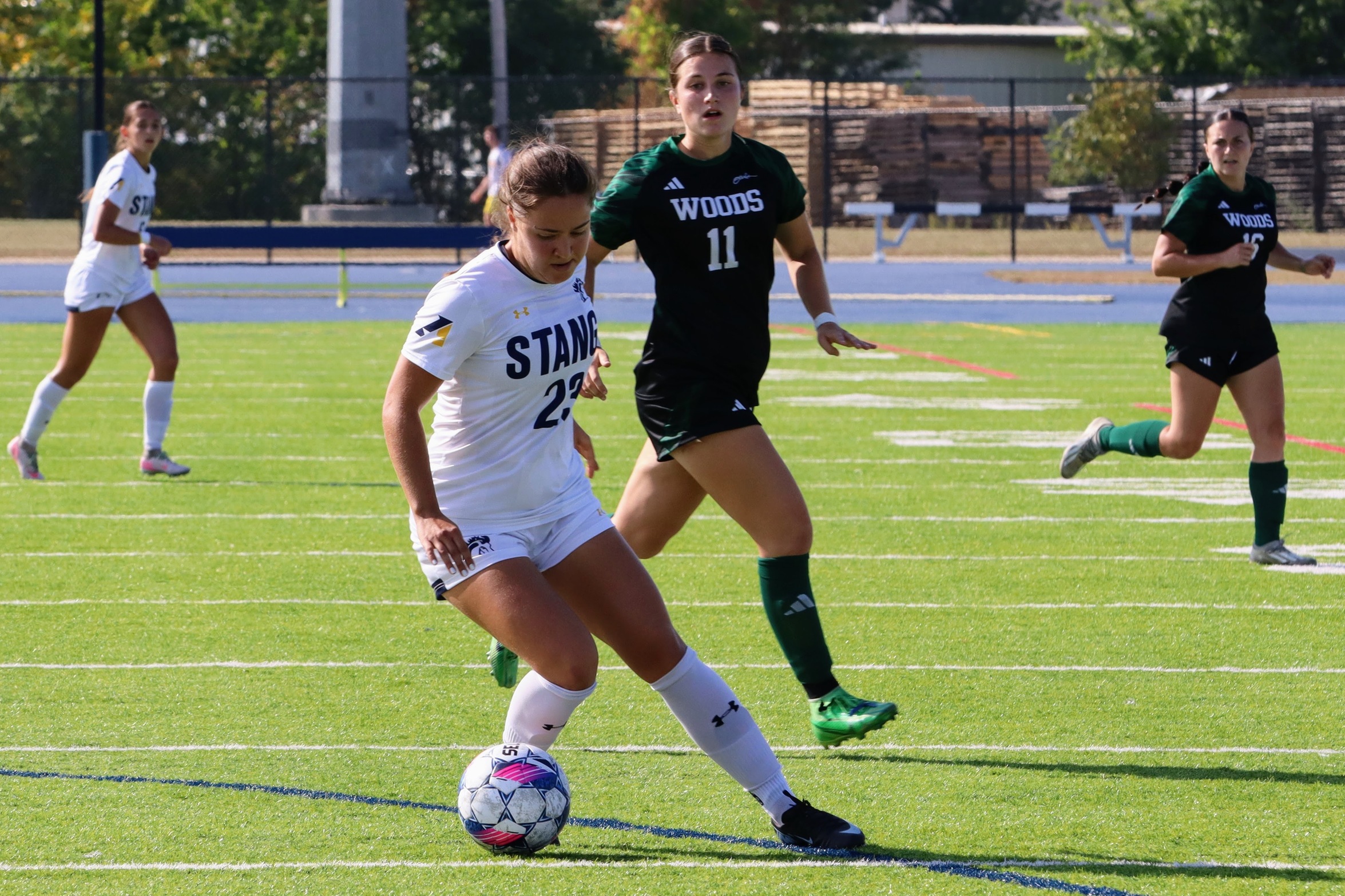 Mustangs Hold Off Baker to Return to Win Column